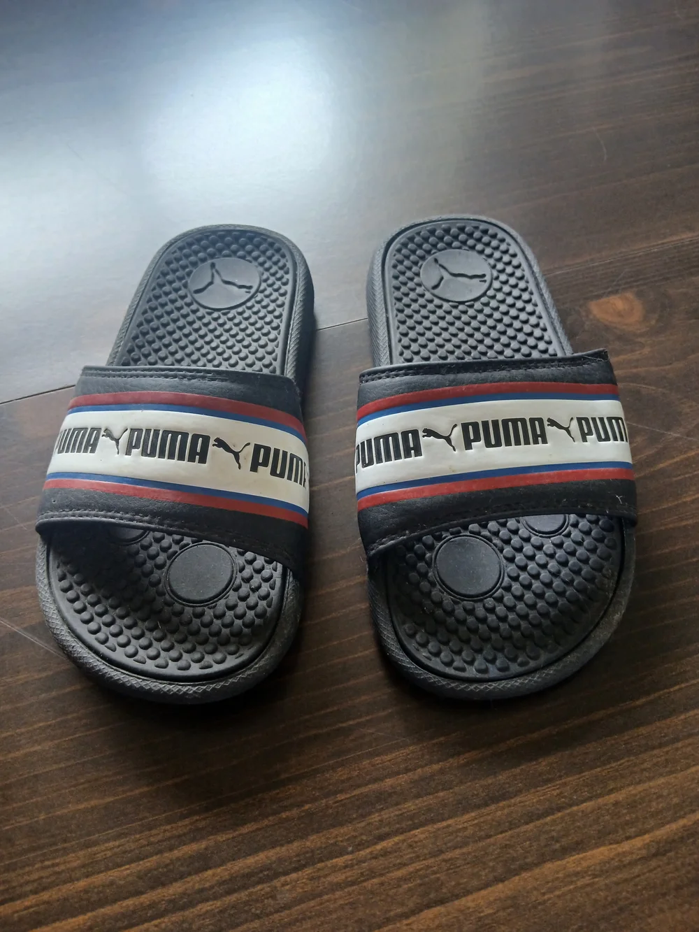 Puma Black Slide Sandal with Red, White & Blue Stripe